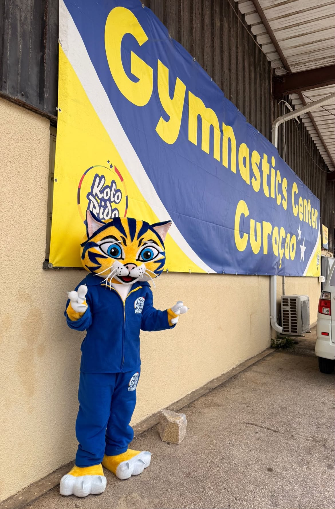 Shine, Kolorido mascot, at Gymnastics Center Curaçao